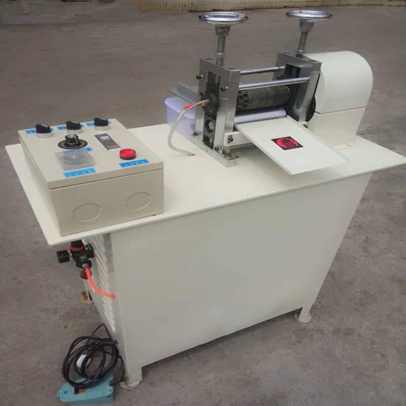 <b>气压皮带滚轮压花机价格</b>